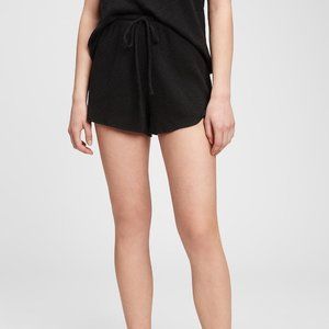 Softspun knit. Elasticized smocked waist.